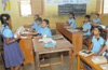 Students don the role of teachers in this school !